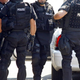 SWAT team members argue over who will be the next person to sit through another enthralling hour and a half of Howard recounting his exploits reffing youth soccer games.